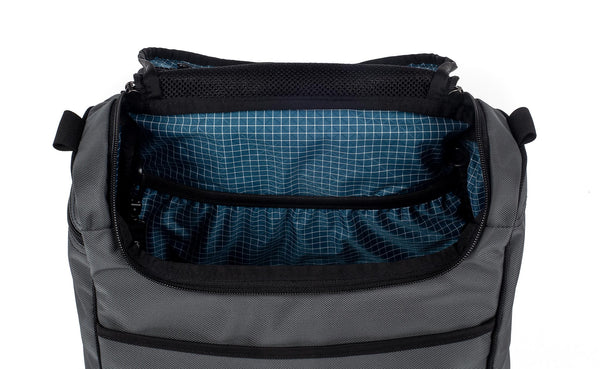 The interior of the main compartment with the large elasticized pocket and two o-rings